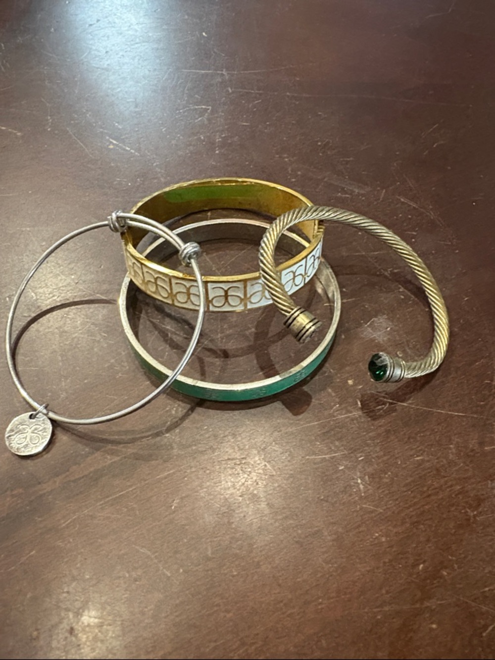 Bundle of 4 Arbonne logo bracelets